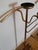 Pair of beautifully crafted, classic-style brass valet stands. Four lion's paw feet, shoe shelf in mica with a wood-like...
