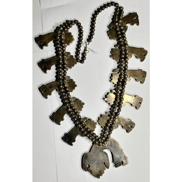 Museum quality 1960s Gilbert Ortega Zuni, rainbow man Squash necklace Weighs 360 g or approximately 12 ounces 27 inches long