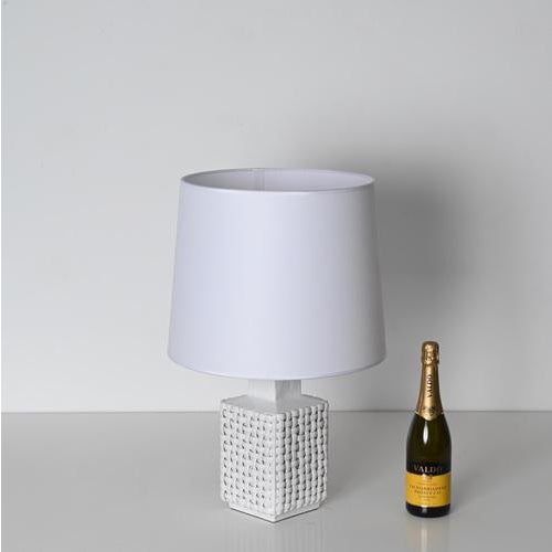 Stunning mid-century white glazed ceramic lamp designed and signed by tommaso barbi and produced in italy during the 1970....