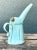 This vintage ceramic pitcher brings an appealing aqua hue and an abstract, mid-20th-century sensibility to a room. Its...
