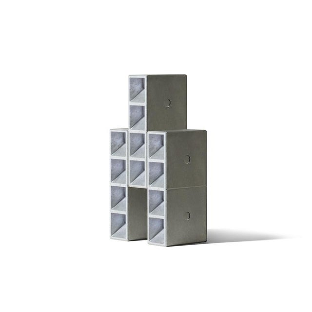 Mario tsai, aluminium tsai table lamp by cassina unit of light a collection of modular metal lamps in which the base unit...