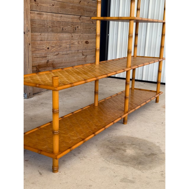Charming vintage faux bamboo–style tiered shelving unit featuring woven rattan parquetry shelves and turned bamboo-...