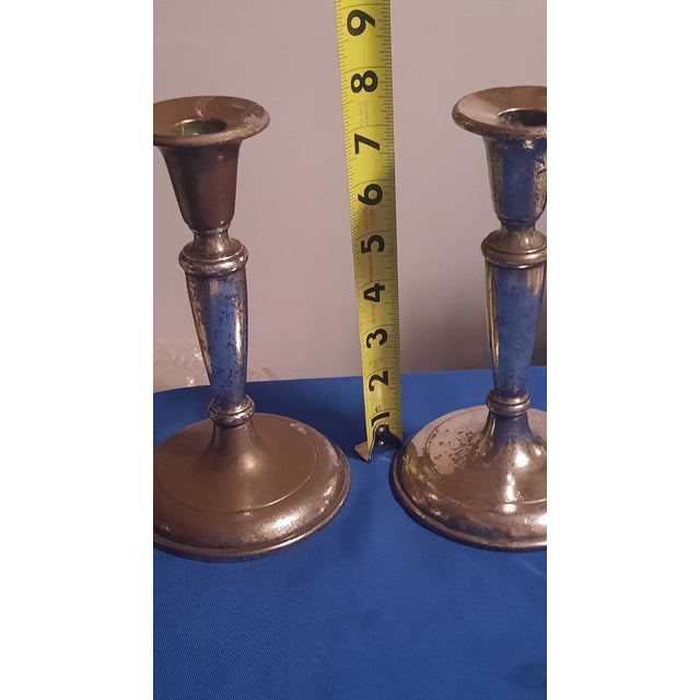 Pair of vintage silverplate candlesticks made by D.W. Haber & Son, New York and marked Waldorf Astoria on the underside....