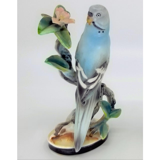 Blue and Yellow Parakeet Bird Porcelain Figurines With Pink Flowers by