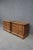 A pair of cherry wood nightstands from the Melrose Collection by Guy Chaddock & Co. Each features three dovetailed drawers...