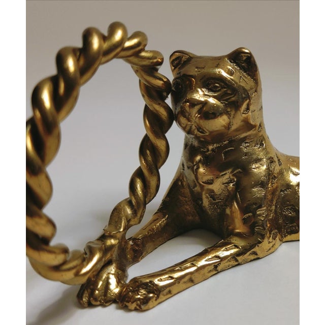 For your consideration. . . An exquisite rare vintage set of ornate gleaming brass Jaguar napkin ring holders. These...