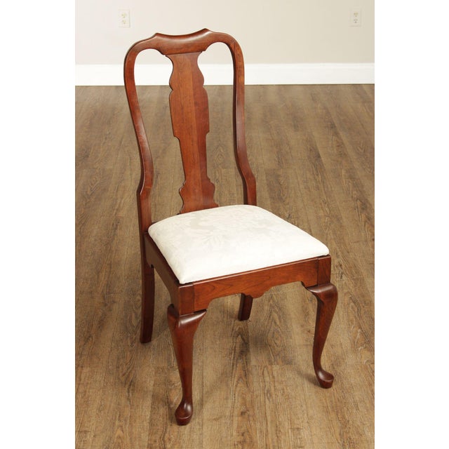 High Quality American Made Set of Eight Carved Cherry Dining Chairs with Custom Upholstered Seats, Includes Two Armchairs