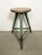Vintage Industrial factory stool made in former Czechoslovakia during the 1960s It features a wooden seat and a green iron...
