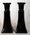 A pair of black porcelain candle holders that look great with taper stick candles.