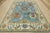 This traditional Oushak rug is hand-knotted with an all-wool pile on a cotton foundation. This rug is new and in excellent...