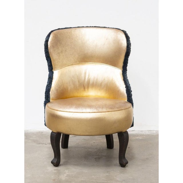This iconic sellerina armchair is produced by baxter, a symbol of made in italy excellence, designed by paola navone. a...