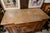 19th century French side cabinet. With oak secondary wood.The cabinet features fine parquetry inlays. It is designed with...