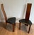 This pair of chairs is made from exotic wood with black leather seats. This is a French work. Circa 1970