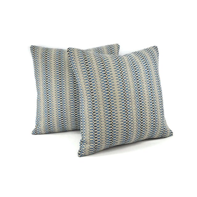 From Manuel Canovas is Daksha in the color Ciel pillow cover. Tanish gray chenille with navy, blue, and light blue color...