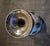 This is an art studio pottery ceramic vase featuring a baluster shape with a bulbous body, a slender neck, and a wide,...