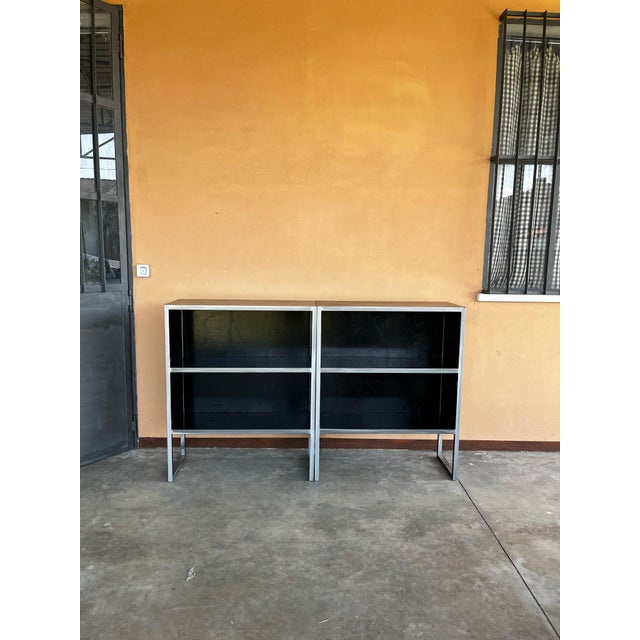 Black leather bookcase with steel structure by Baxter form Italy form 1990s period. Excellent conditions. They were part...