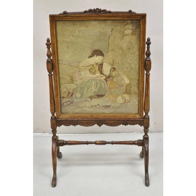 Antique French Victorian Carved Walnut and Needlepoint Fireplace Screen. Circa Late 19th Century. Measurements: 39" H x...