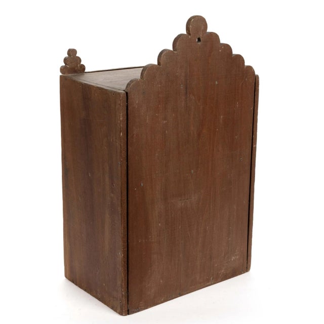 AMERICAN POPLAR DIMINUTIVE HANGING CABINET, of rectangular form with a cut-out backing board with a hole from which to...