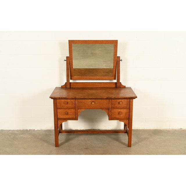 An exceptional antique Mission or Arts & Crafts period vanity or dressing table with mirror In the manner of Charles P....