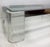Vintage Lucite and Chrome Coffee Table in Karl Springer Style Offered for sale is a substantial vintage chrome and Lucite...