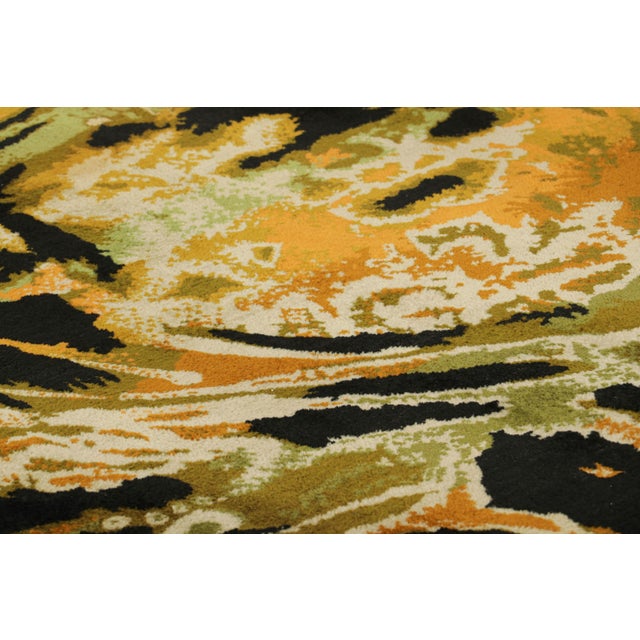 Hand-knotted in wool and originating in France, this vintage 7x9 tapestry is a rare and special new curation from Rug &...