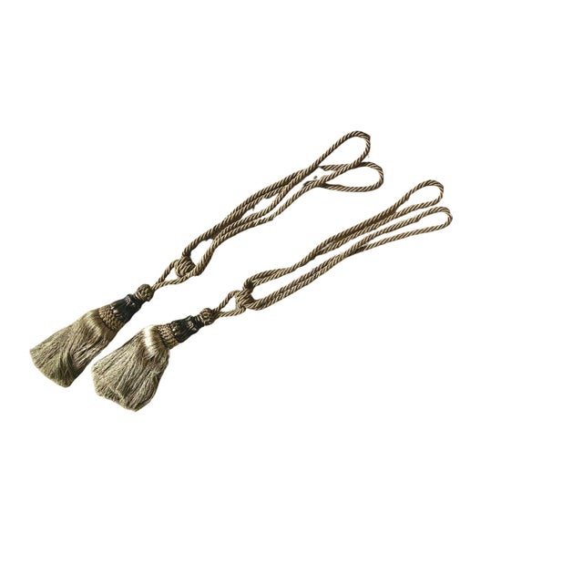 Elegant and regal curtain rope tieback fasteners with tassels for rich living room and home drapery accents. Elevate your...