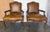 This perfectly matched pair of fauteils embodies the opulence and romance of 18th-century France. Each chair features the...