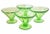 Set of four vintage glass stemmed dessert coupes in a fluted pattern, circa 1930. These will fluoresce under black light....