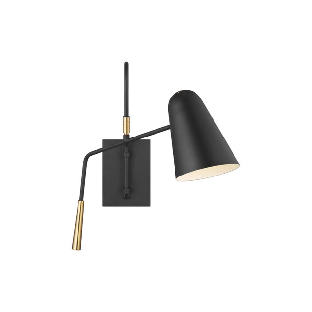 The Simon one light wall sconce in Midnight black offers shadow-free lighting in your powder room, spa, or master bath...