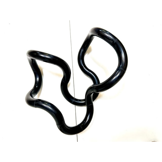 Designed by the American artist Richard X. Zawitz and patented in 1981, the large-scale sculpture Tangle represents one of...