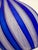 This vintage hand blown vase is eye-catching with its cobalt blue and latticework stripes. The lattice technique, called...