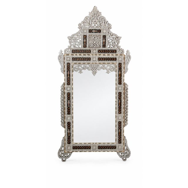 An exceptional large antique Levantine Damascene mirror, attributed to Lebanon and dating from the late 19th century,...