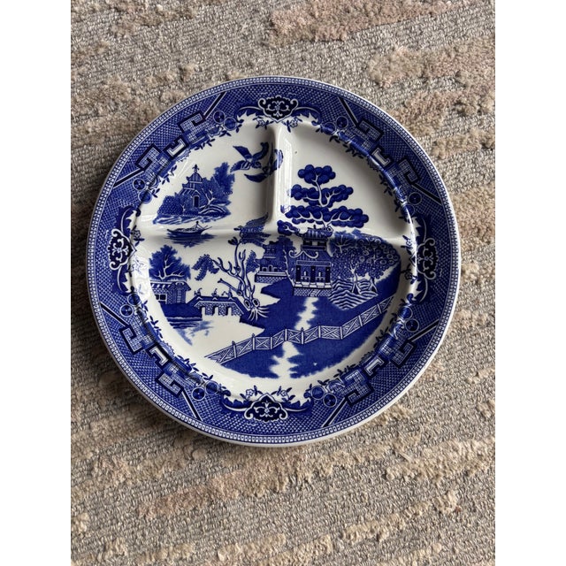 A beautiful assembled set of eight blue and white Blue Willow pattern partitioned plates, likely mid-century, all marked...