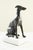 Bronze style Whippet dog presented on a plinth carved marble base. Every aspect of this sculpture is a testament to the...