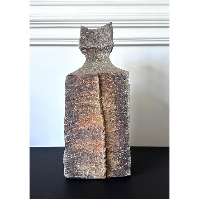 A striking stoneware vase made in the tradition of Shigaraki ware by celebrated Japanese potter Kohyama Yasuhisa (1936-)...