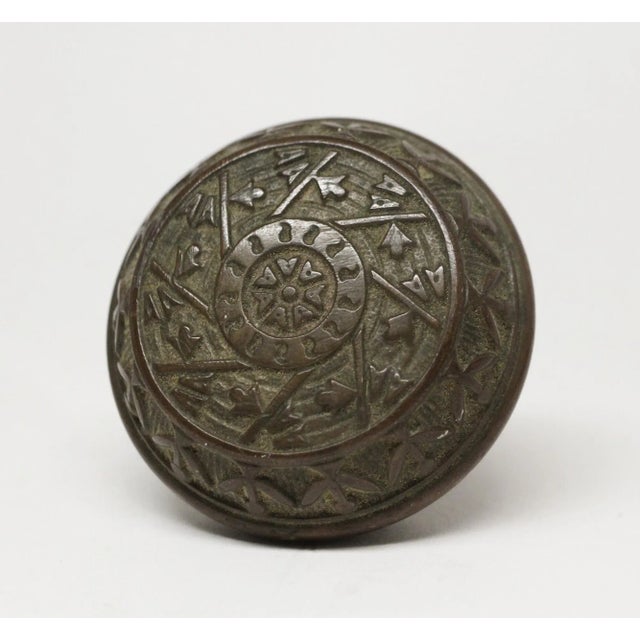 Vernacular style bronze passage door knob was made by Reading in the 1897 catalog. The Windsor series still sold until...