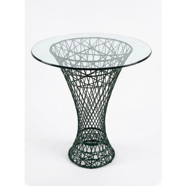 Elevate your plant collection or outdoor living space with this iconic Mid-Century Modern spun fiberglass plant stand...