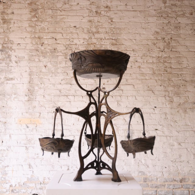 Add refined elegance and sculptural beauty to your space with this 19th century French Art Nouveau bronze centerpiece by...