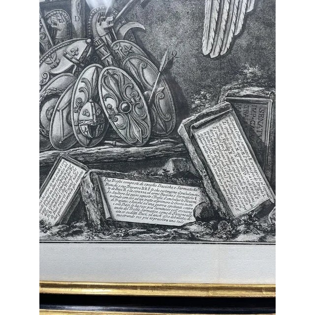 Piranesi engraving "Trophy of the Dacians" "Bas-relief on Trajan's Column" This piece has an attribution mark, I am sure...