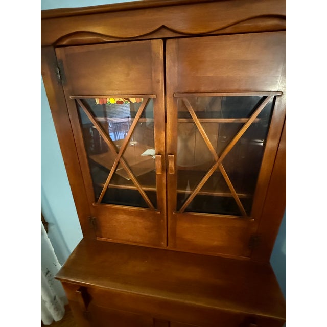 Discover the timeless beauty of this Cushman Colonial Creations China Cabinet No. 6024, a rare and historic piece of...