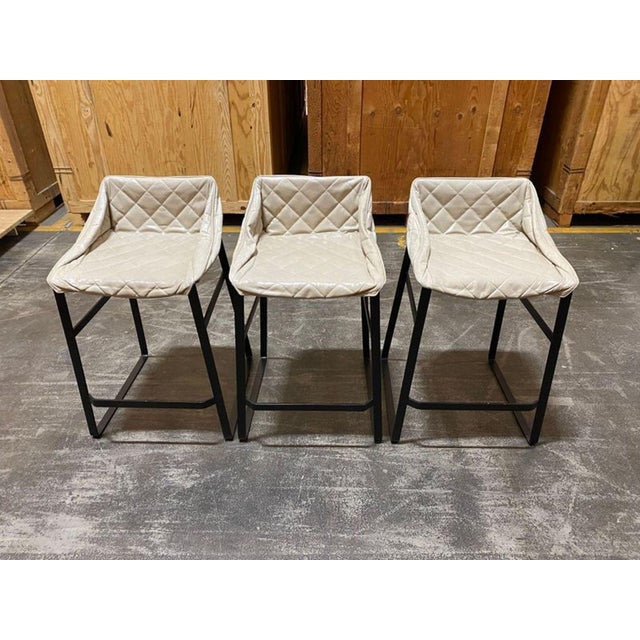 Quilted leather upholstery on a powder-coated steel base. Brand: Studio Piet Boon. Original Price: $8000. Dimensions (in):...