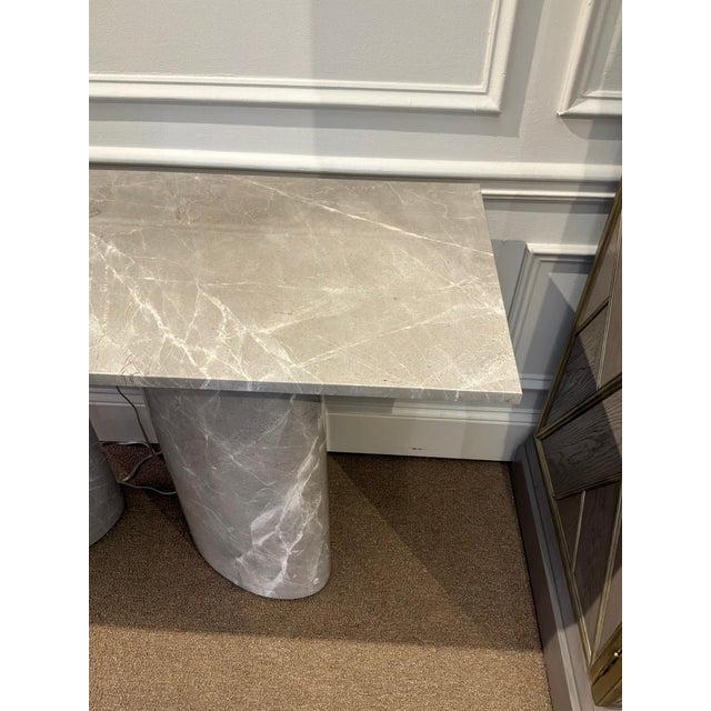 Baker Luxe Zora Console Table. Rectangular top with oval shaped legs, gray/white marble. Original Retail $7347. Showroom...