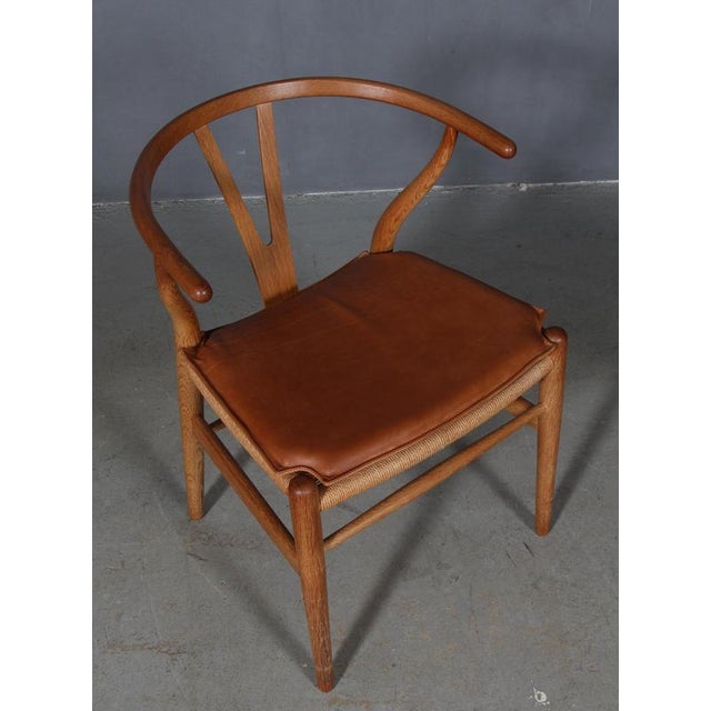 Hans J. Wegner cushions for wishbone chair model CH24. Made in cognac vintage aniline leather and good quality foam. Only...