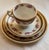 The oldest set dates from 1880 and the newest from 1910. There are four cups and saucers. They are in perfect condition...
