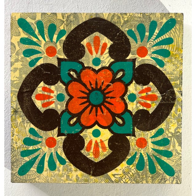 Ganas Talavera, a 2015 mixed-media work by Ernesto Yerena Montejano on a cradled wood panel. A symmetrical floral design...