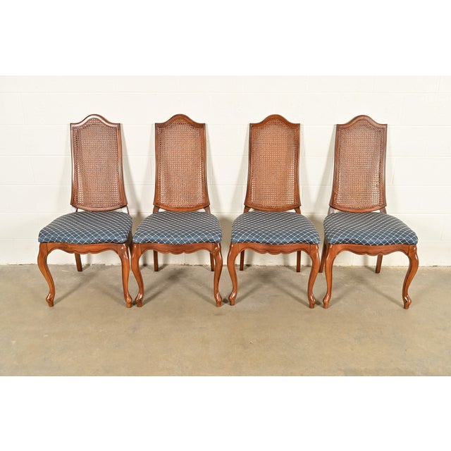 A gorgeous set of four French Provincial Louis XV style dining chairs In the manner of Baker Furniture USA, Circa 1960s...