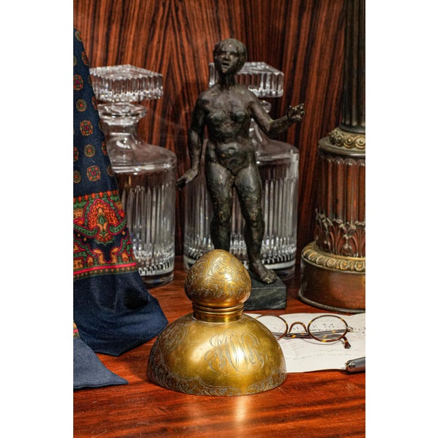 Discover the timeless elegance of the Victorian Aesthetic Movement with this exquisite brass inkwell, a true reflection of...