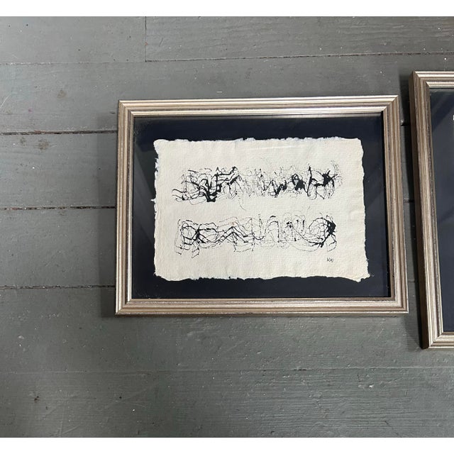 Set of two 1970’s original abstract paintings in silver leaf frames. Signed. Measure approx 6x8 each or 9x11.5 in frames....