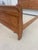 Bench-made king-size sleigh bed crafted from solid maple with a warm medium-brown finish. The headboard and footboard...