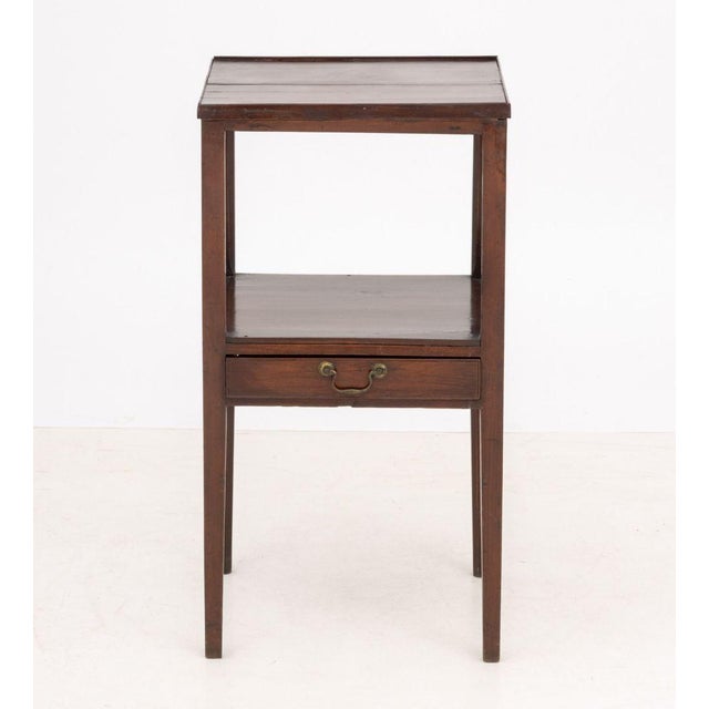 George III Style Mahogany Two-Tier Side Table, with single drawer. 29.25" H x 15.5" W x 15.25" D. Provenance: The Estate...